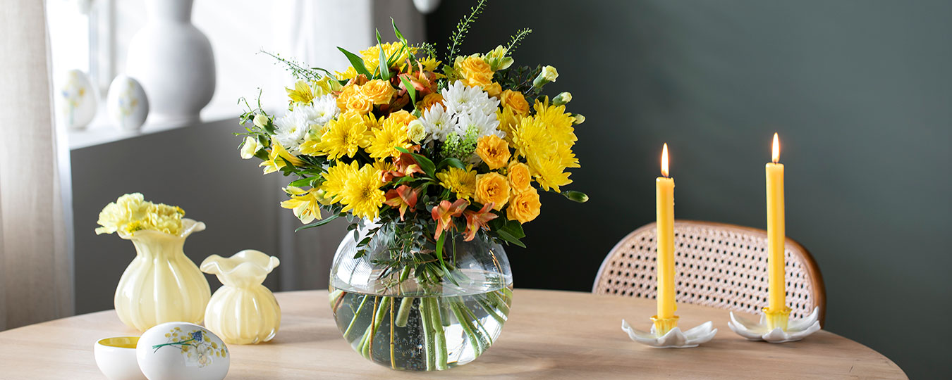 Interiør- og blomsterbilde med klikkbare elementer